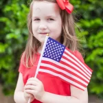 - adorable little girl holding american flag outdoor rnd958 frp4692897 - Home
