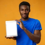 african american man showing blank digital tablet rnd456 frp29310503 - title:Home - اورچین فایل - format: - sku: - keywords:وکتور,موکاپ,افکت متنی,پروژه افترافکت p_id:63922