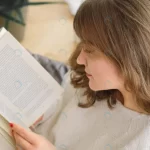 - beauty young woman is reading book home crc9b447930 size8.8mb 4912x3264 1 - Home