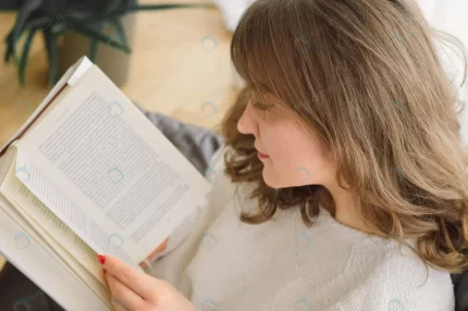 beauty young woman is reading book home crc9b447930 size8.8mb 4912x3264 1 - title:graphic home - اورچین فایل - format: - sku: - keywords: p_id:353984