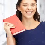 bright picture happy smiling woman with book crc8c2aa271 size9.14mb 3164x4704 - title:Home - اورچین فایل - format: - sku: - keywords:وکتور,موکاپ,افکت متنی,پروژه افترافکت p_id:63922