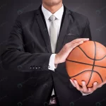 businessman holding basketball rnd623 frp8304792 1 - title:Home - اورچین فایل - format: - sku: - keywords:وکتور,موکاپ,افکت متنی,پروژه افترافکت p_id:63922
