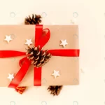 - christmas gift box with red bow beige background crc5078a1b3 size4.10mb 6240x4160 - Home