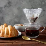 close up coffee with tasty croissant crc8b11b895 size8.84mb 4967x3311 1 - title:Home - اورچین فایل - format: - sku: - keywords:وکتور,موکاپ,افکت متنی,پروژه افترافکت p_id:63922