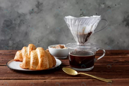 close up coffee with tasty croissant crc8b11b895 size8.84mb 4967x3311 1 - title:graphic home - اورچین فایل - format: - sku: - keywords: p_id:353984