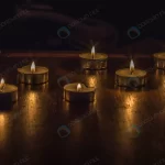 closeup shot burning candles wooden table crc2d953722 size12.25mb 5472x2573 - title:Home - اورچین فایل - format: - sku: - keywords:وکتور,موکاپ,افکت متنی,پروژه افترافکت p_id:63922