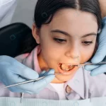 closeup view dentist examines teeth little girl w crc02af249f size18.18mb 7952x5304 - title:Home - اورچین فایل - format: - sku: - keywords:وکتور,موکاپ,افکت متنی,پروژه افترافکت p_id:63922