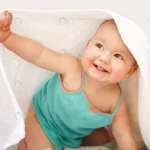 cute smiling baby looking white towel white backg crc75a6da6d size5.90mb 4550x3033 - title:Home - اورچین فایل - format: - sku: - keywords:وکتور,موکاپ,افکت متنی,پروژه افترافکت p_id:63922