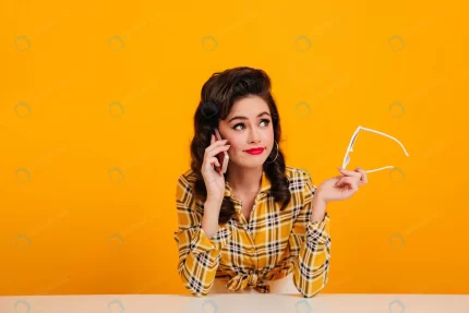 elegant young woman talking phone yellow backgrou crcc9751d25 size6.03mb 5310x3540 - title:graphic home - اورچین فایل - format: - sku: - keywords: p_id:353984