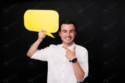 excited young man pointing yellow bubble speech s crc90d5edde size6.81mb 6016x4016 - title:graphic home - اورچین فایل - format: - sku: - keywords: p_id:353984