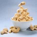 falling cashew nuts into bowl with copy space crc211152d3 size12.86mb 5404x3901 - title:Home - اورچین فایل - format: - sku: - keywords:وکتور,موکاپ,افکت متنی,پروژه افترافکت p_id:63922