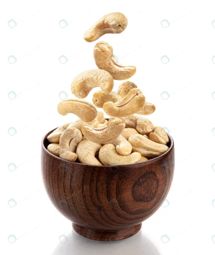falling cashew nuts into wooden bowl isolated whi crc895efdab size5.15mb 3856x4585 - title:تاریخچه، معرفی و منابع فایل های استوک - اورچین فایل - format: - sku: - keywords:تاریخچه، معرفی و منابع فایل های استوک,فایل استوک,فایل های استوک,معرفی,منابع فایل های استوک p_id:347137