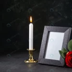 front view burning candle with picture frame dark crc3e6c95cb size10.43mb 5600x3737 - title:Home - اورچین فایل - format: - sku: - keywords:وکتور,موکاپ,افکت متنی,پروژه افترافکت p_id:63922