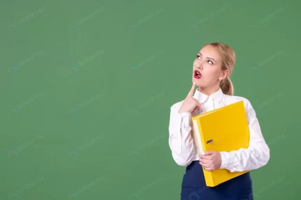 front view female teacher holding yellow files wi crc74eadca3 size7.84mb 5600x3733 - title:graphic home - اورچین فایل - format: - sku: - keywords: p_id:353984