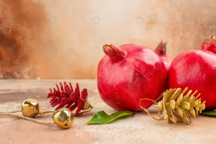 front view fresh red pomegranates light backgroun crc7c4715f4 size13.55mb 5600x3733 1 - title:graphic home - اورچین فایل - format: - sku: - keywords: p_id:353984