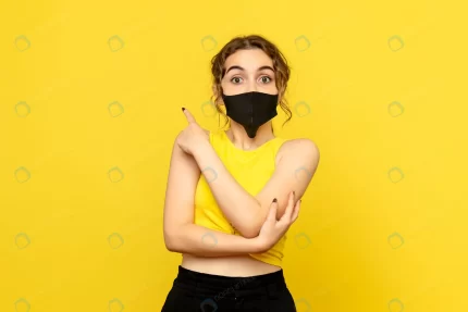 front view pretty female black mask yellow crc8a352907 size6.61mb 5600x3736 - title:graphic home - اورچین فایل - format: - sku: - keywords: p_id:353984