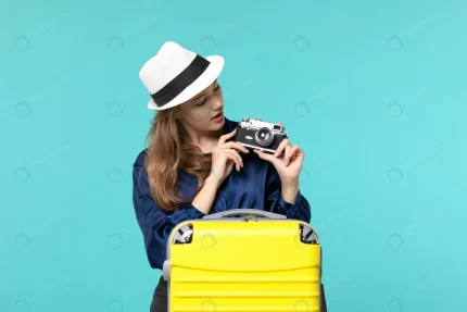 front view young woman holding camera taking phot crceeb08a7b size13.53mb 6720x4480 1 - title:graphic home - اورچین فایل - format: - sku: - keywords: p_id:353984