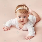 - girl four months lies light pink background crc23d7ce29 size12.66mb 6904x4602 - Home