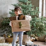- girl holding christmas gift boxes crc93d68e4c size17.9mb 3648x5472 - Home