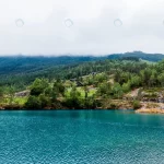 green mountain landscape with blue idyllic lake crcafb56635 size12.07mb 5424x3616 - title:Home - اورچین فایل - format: - sku: - keywords:وکتور,موکاپ,افکت متنی,پروژه افترافکت p_id:63922