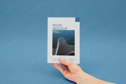 hand holding book mockup crc266d739f size62.07mb - title:graphic home - اورچین فایل - format: - sku: - keywords: p_id:353984