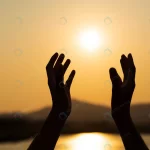 hands praying blessing from god during sunset bac crc1244550c size6.84mb 5520x3684 - title:Home - اورچین فایل - format: - sku: - keywords:وکتور,موکاپ,افکت متنی,پروژه افترافکت p_id:63922