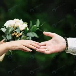 hands with wedding rings bouquet green background rnd893 frp22884208 - title:Home - اورچین فایل - format: - sku: - keywords:وکتور,موکاپ,افکت متنی,پروژه افترافکت p_id:63922