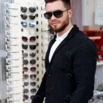 handsome man model chooses fashion sunglasses opt crc00786585 size10.72mb 4000x6000 1 - title:Home - اورچین فایل - format: - sku: - keywords:وکتور,موکاپ,افکت متنی,پروژه افترافکت p_id:63922