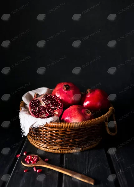 high angle basket with autumn pomegranates copy s crc6dce8e13 size1.15mb 3648x5107 - title:graphic home - اورچین فایل - format: - sku: - keywords: p_id:353984