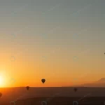 hot air balloons sky during sunrise travel dreams crc6539418b size9.92mb 6016x4016 - title:Home - اورچین فایل - format: - sku: - keywords:وکتور,موکاپ,افکت متنی,پروژه افترافکت p_id:63922