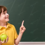 kid holding apple while pointing up crc2a502a6d size1.77mb 6719x4760 - title:Home - اورچین فایل - format: - sku: - keywords:وکتور,موکاپ,افکت متنی,پروژه افترافکت p_id:63922