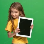 little funny girl with tablet green studio backgr crc3d088792 size13.15mb 5760x3840 - title:Home - اورچین فایل - format: - sku: - keywords:وکتور,موکاپ,افکت متنی,پروژه افترافکت p_id:63922