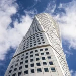 - low angle view turning torso blue sky sunlight ma crc50638923 size11.84mb 5684x3789 - Home