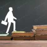 man walking up stairs from books education knowle crcb78afb1f size6.97mb 6720x3612 - title:Home - اورچین فایل - format: - sku: - keywords:وکتور,موکاپ,افکت متنی,پروژه افترافکت p_id:63922