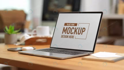mockup laptop wooden table with office supplies st rnd663 frp10467259 - title:graphic home - اورچین فایل - format: - sku: - keywords: p_id:353984