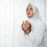 muslim young woman praying white traditional clot crcb209048d size6.49mb 6000x4000 - title:Home - اورچین فایل - format: - sku: - keywords:وکتور,موکاپ,افکت متنی,پروژه افترافکت p_id:63922