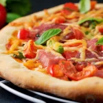 - pizza with salami ham tomato cheese mushrooms crce7df637f size6.51mb 6000x2327 - Home