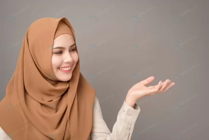 portrait beautiful woman with hijab is showing so crc70f48842 size4.88mb 4000x2666 - title:graphic home - اورچین فایل - format: - sku: - keywords: p_id:353984