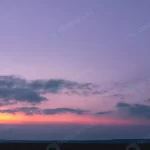 purple sunset with sun clouds colorful cloudy sky crc5bdc2765 size13.27mb 10000x3757 - title:Home - اورچین فایل - format: - sku: - keywords:وکتور,موکاپ,افکت متنی,پروژه افترافکت p_id:63922