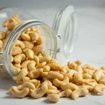 raw cashews nuts open glass jar marble background crc943ebdd2 size8.11mb 5760x3840 - title:Home - اورچین فایل - format: - sku: - keywords:وکتور,موکاپ,افکت متنی,پروژه افترافکت p_id:63922