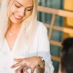 smiling blonde young woman looking her ring given crcef2da3d1 size6.64mb 3840x5760 1 - title:Home - اورچین فایل - format: - sku: - keywords:وکتور,موکاپ,افکت متنی,پروژه افترافکت p_id:63922