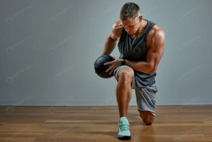 strong man doing exercise with med ball photo man rnd245 frp8143758 - title:graphic home - اورچین فایل - format: - sku: - keywords: p_id:353984