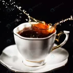 tea splashes white cup black background crc3c9edf3d size6.86mb 5616x3744 - title:Home - اورچین فایل - format: - sku: - keywords:وکتور,موکاپ,افکت متنی,پروژه افترافکت p_id:63922