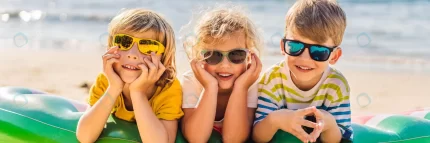 three blond kids sunglasses are lying beach banne crc3995e939 size4.45mb 6000x2000 - title:graphic home - اورچین فایل - format: - sku: - keywords: p_id:353984
