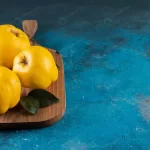- three yellow quince fruits placed wooden board crcbe71f83e size15.13mb 6000x4000 1 - Home