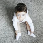 toddler kid white bodysuit sitting carpet crcc12243f1 size13.12mb 6698x4468 - title:Home - اورچین فایل - format: - sku: - keywords:وکتور,موکاپ,افکت متنی,پروژه افترافکت p_id:63922