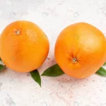 top view fresh oranges bright isolated surface crc73c7b3f4 size9.9mb 5600x3733 - title:Home - اورچین فایل - format: - sku: - keywords:وکتور,موکاپ,افکت متنی,پروژه افترافکت p_id:63922