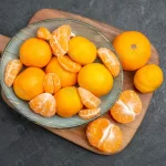 top view tasty juicy tangerines inside plate grey crc3b4e5373 size15.64mb 5600x3737 - title:Home - اورچین فایل - format: - sku: - keywords:وکتور,موکاپ,افکت متنی,پروژه افترافکت p_id:63922