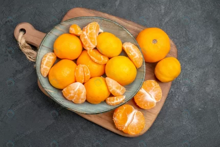top view tasty juicy tangerines inside plate grey crc3b4e5373 size15.64mb 5600x3737 - title:graphic home - اورچین فایل - format: - sku: - keywords: p_id:353984