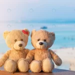 two teddy bears sitting sea view love relationshi crcad5b0b83 size8.59mb 6000x4000 - title:Home - اورچین فایل - format: - sku: - keywords:وکتور,موکاپ,افکت متنی,پروژه افترافکت p_id:63922